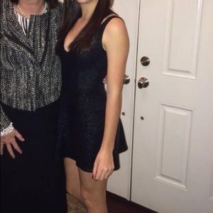 Black shiny pacsun mini dress size XS by motel